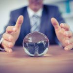 Forecasting - Crystal ball and businessman